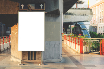 Wall Mural - announcement billboard big blank white led screen perspective vertical outstanding on skytrain platf