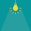 Yellow bulb with rays on blue background. Imagination icon. New business idea.