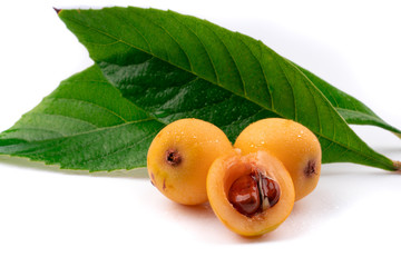 ripe and fresh loquat 0n white background