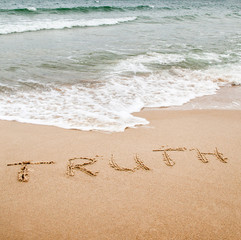 Wall Mural - Word truth written on the sand