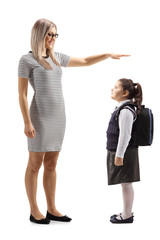 Sticker - Woman gesturing with hand and showing the height of a little schoolgirl