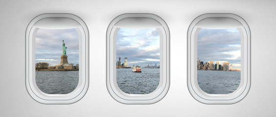 Wall Mural - New York City and Statue Of Liberty as seen through three aircraft windows. Holiday and travel concept