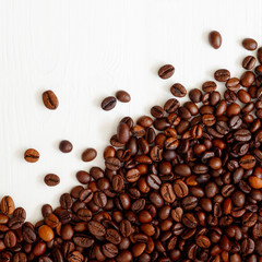 Poster - Coffee  beans isolated on white background with copyspace for text. Coffee background or texture concept.