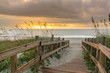 © pabrady63 - Boardwalk Leading to the Beach at Sunrise