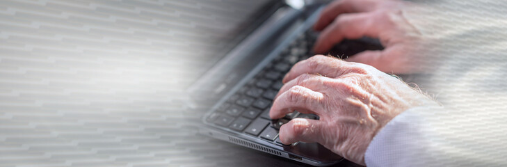 Hands of businessman using laptop, close up. panoramic banner