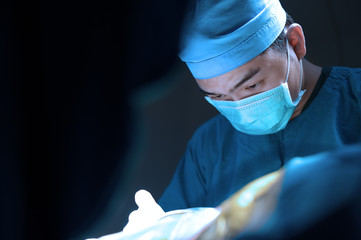 Wall Mural - veterinarian surgery in operation room take with art lighting and blue filter