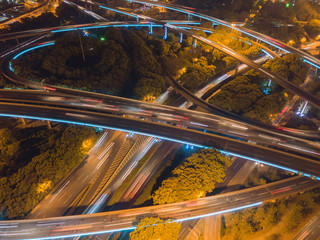Aufkleber - Aerial view of highway junctions at night. Bridges, roads, or streets in connection or transportation concept. Structure of architecture in urban city, Shanghai Downtown, China.
