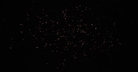 Wall Mural - explosion and fireballs burst. particles moving around. 4k vfx element black background