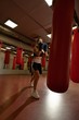 © Wisky - Young blonde in boxing gloves in a gym