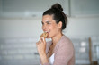 Pregnant woman eating cookies
