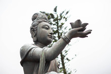 HONG KONG - 18 Apil 2019 : Bronze Buddhist Statues Praising And Making Offer To The Tian Tan Big Buddha.