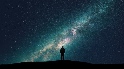 Wall Mural - The male standing against the starry sky. time lapse