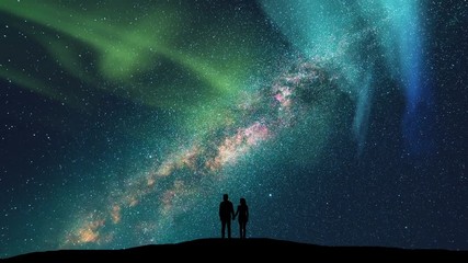 Wall Mural - The couple standing on the starry sky background. time lapse