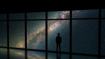 Wall Mural - The male standing near the window on the meteor shower background. time lapse