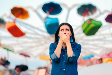 Woman Having Motion Sickness on Spinning Ferris Wheel Background