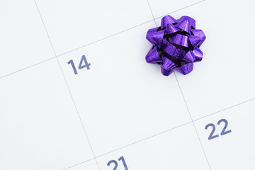 Wall Mural - Monthly calendar with a purple bow