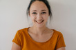 © Westend61 - Portrait of a smiling young woman