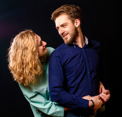 young sexy couple portrait photo on black background