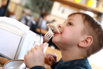 Child has cherry dumplings