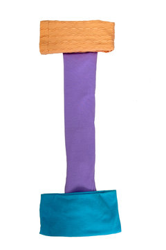 Letter I made of different colored cloth on a white background. Isolated