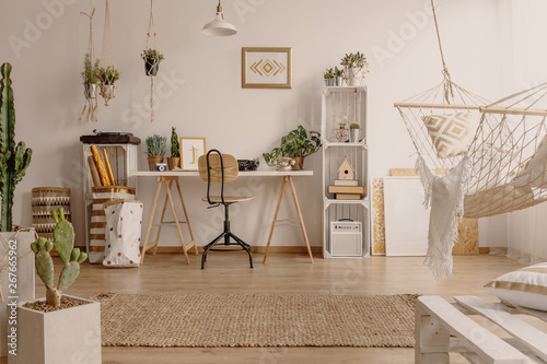 White Home Office Room Interior With Fresh Plants Rug On The