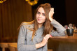 © Kiryl Lis - Portrait of beautiful smiling girl with long hair in the cafe. Coffee time.