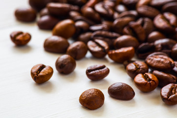 Poster - Coffee  beans isolated on white background with copyspace for text. Coffee background or texture concept.
