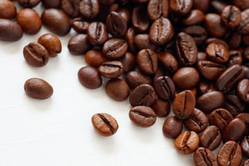 Poster - Coffee  beans isolated on white background with copyspace for text. Coffee background or texture concept.