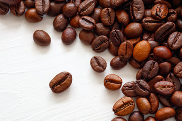 Poster - Coffee  beans isolated on white background with copyspace for text. Coffee background or texture concept.