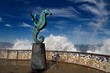 The Boy on a Seahorse sculpture Puerto Vallarta Malecon with splash of Pacific sea