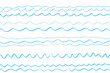 Abstract wavy wallpaper of the surface. Waved nautical background. Colored pattern with lines and waves. Sea dinamic texture. Doodle for design