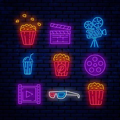 Cinema, bright neon signs, logos, emblems, labels. Signs for web direction, advertising design, banner and more. Icons popcorn, camera, slapstick, soda, 3D glasses, reel and movie icon.