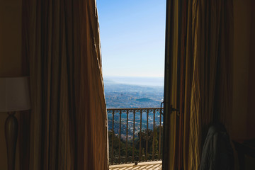  balcony with curtains and barcelona view