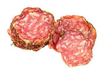 Wall Mural - Saucisson Sec French seasoned pork salami meat slices isolated on a white background