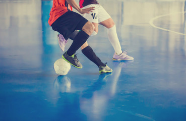 Indoor soccer sports hall. Football futsal player, ball, futsal floor