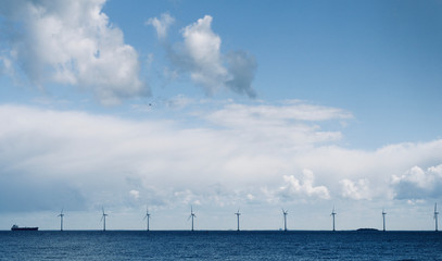 Offshore wind turbines on the coast of Copenhagen in Denmark 