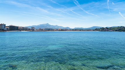 Seascape of Saint Jean de Luz with the blue ocean. Donibane, Basque Country of France.