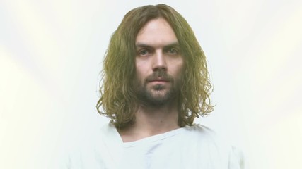 Poster - Jesus Christ looking into camera on isolated bright background, religion, faith