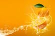 Fresh Sliced ​​oranges and Orange fruit on Orange background