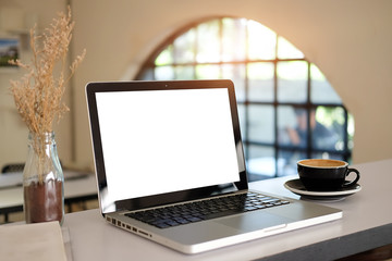 Fototapete - Mock up Copy Space Blank Screen workspace with computer laptop on table.
