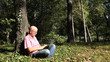 © EuStock - Image with Relaxed Person in Park Using Laptop Internet Connection