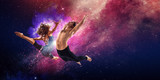 Fototapeta Sport - Young modern ballet dancers in a jump. Mixed media