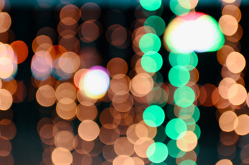 Colorful orange and green bokeh defocused on background