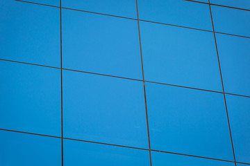 Modern office building with blue glass windows