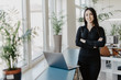 © F8  \ Suport Ukraine - Portrait of successful young businesswoman standing at her office.