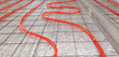 © schankz - Installing a hose for underfloor heating in the room