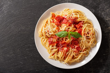 plate of pasta with tomato sauce, top view