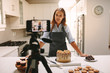 Woman vlogger recording video for food channel