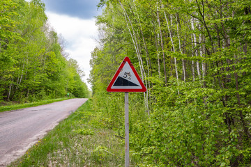 Road signs on the side of the road, caution for drivers