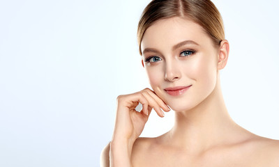 beautiful young woman with clean fresh skin . facial treatment . cosmetology , beauty and spa . blon